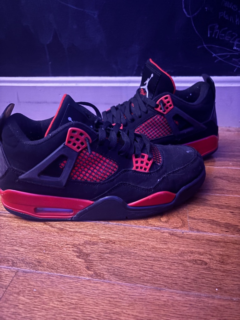 Jordan 4s Black and Red thunder